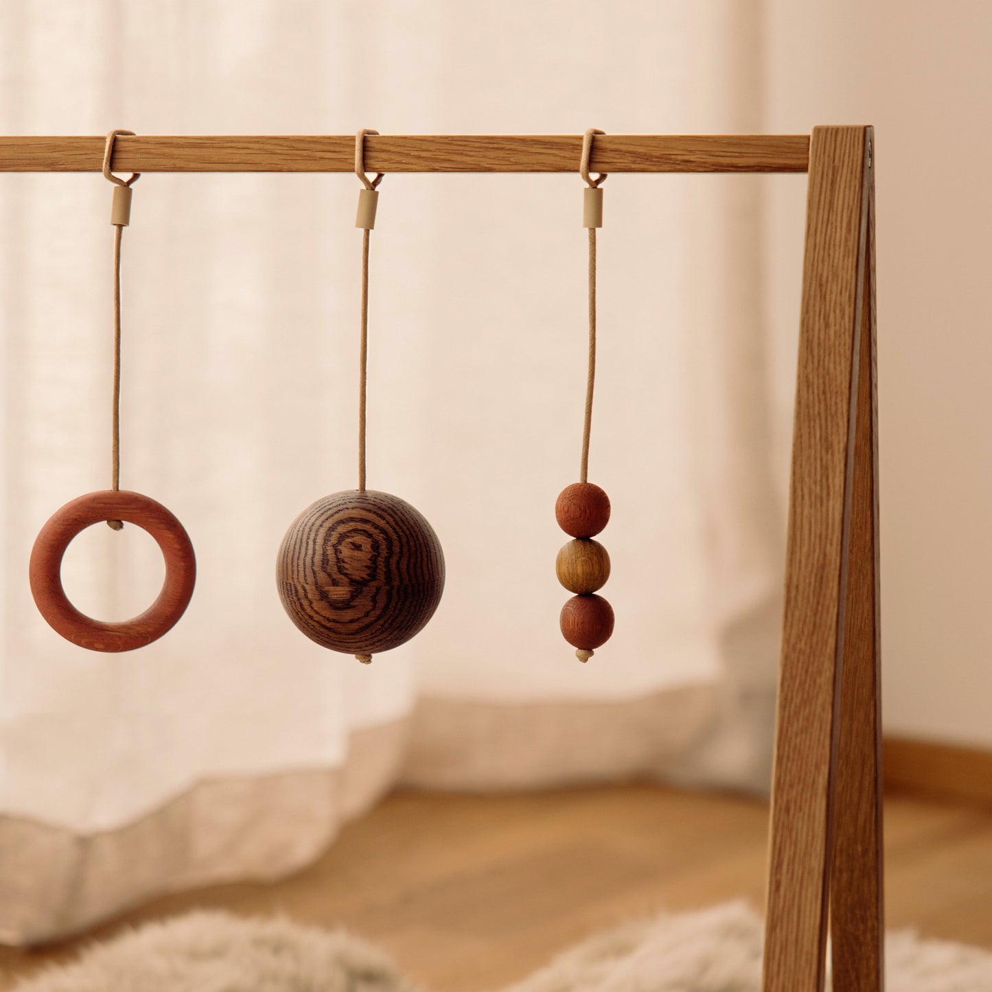 Wooden baby gym details made of FSC-certified solid oak. Play & Read in Natural Oak with Earth Palette by Woodsie Wonder.