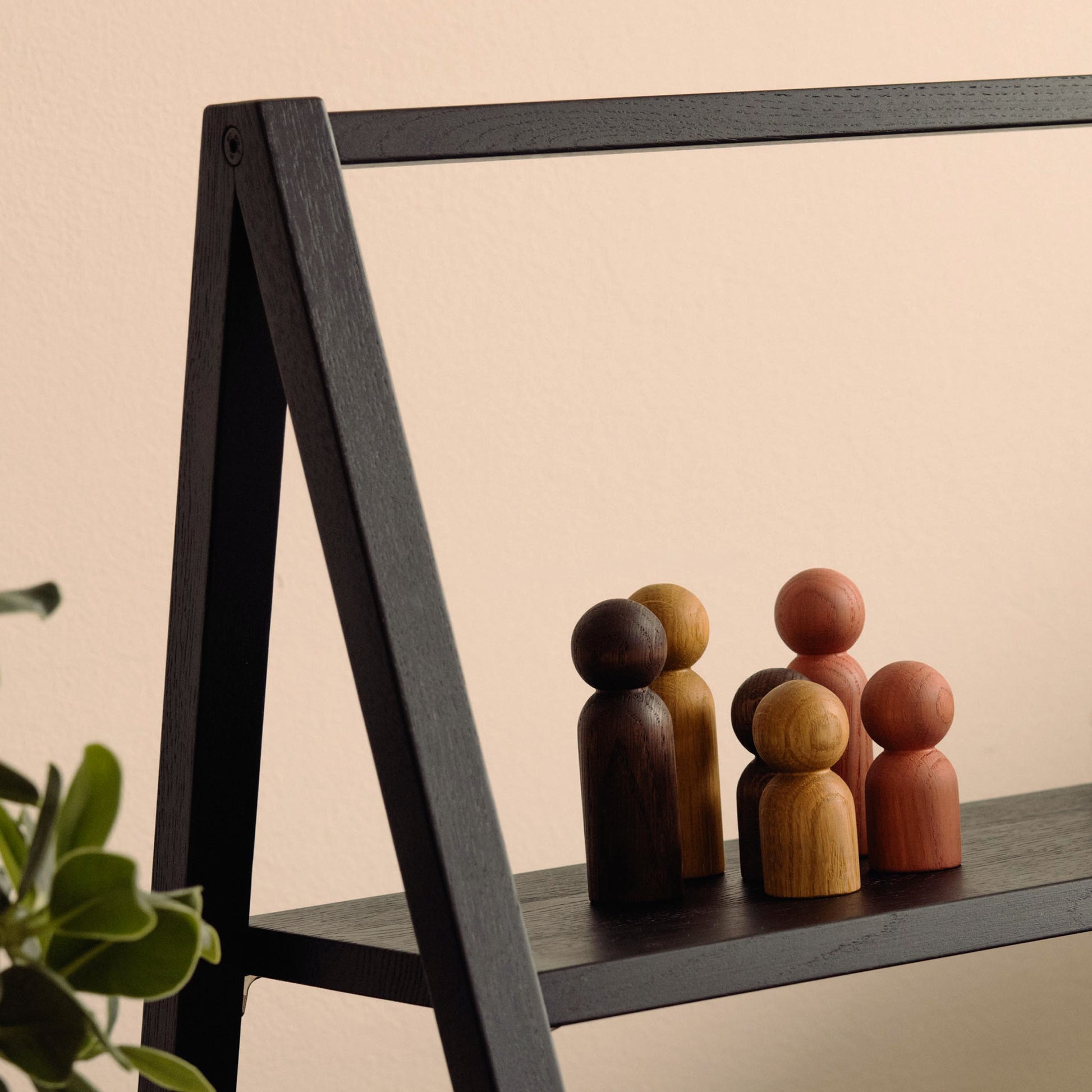 Wooden Montessori bookshelf made of FSC-certified solid oak in Black Oak by Woodsie Wonder.