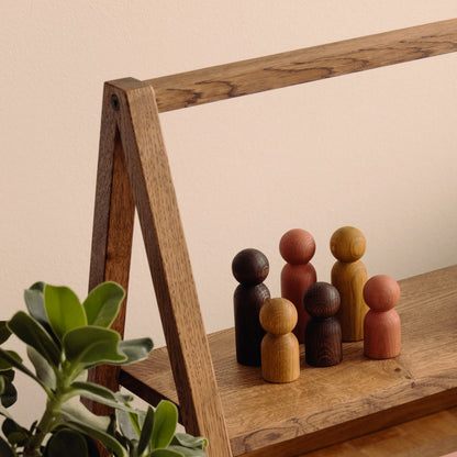 Wooden Montessori bookshelf made of FSC certified solid oak in Brown Oak by Woodsie Wonder.