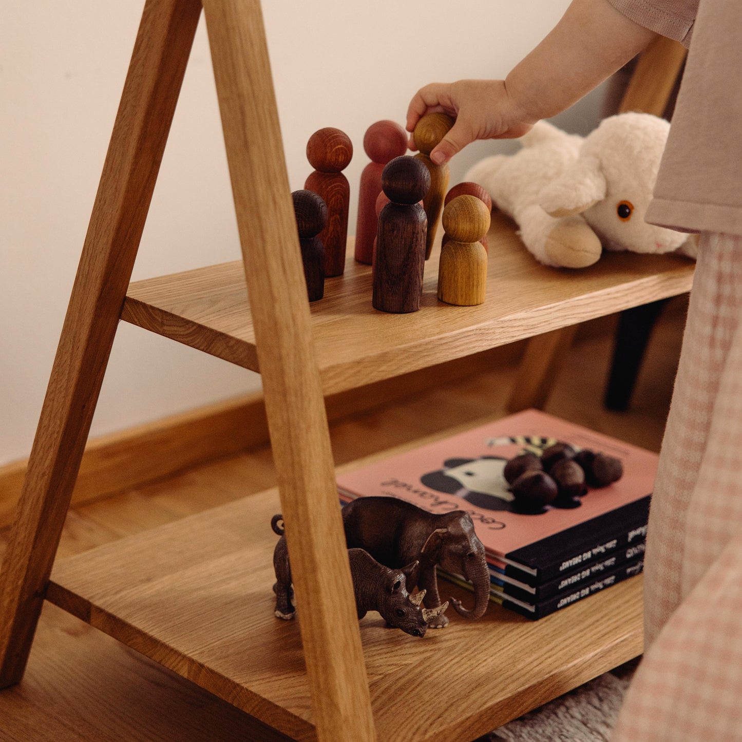 Wooden Montessori bookshelf made of FSC-certified solid oak in Natural Oak by Woodsie Wonder.