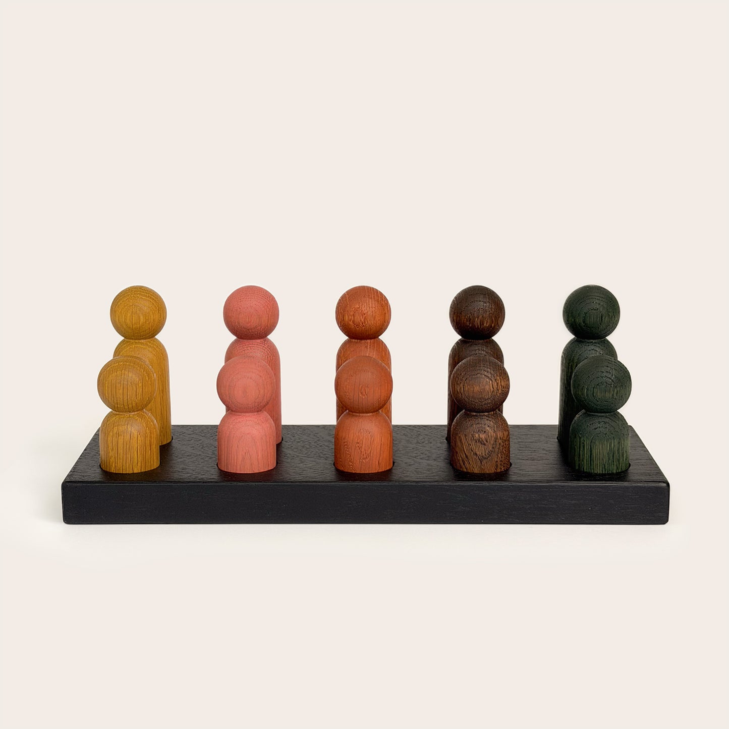 Play & Hang in Black Oak with Earth Palette, a wooden sorting toy that transforms into a children's coat rack by Woodsie Wonder.