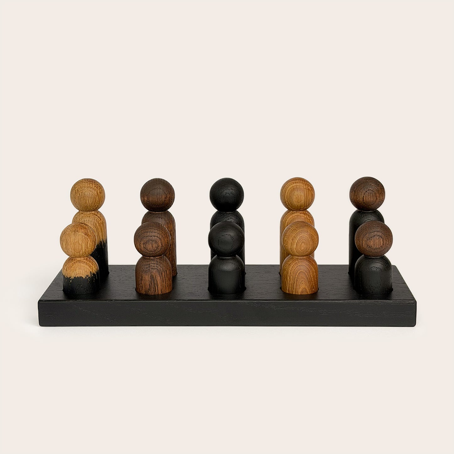 Play & Hang in Black Oak with Mono Palette, a wooden sorting toy that transforms into a children's coat rack by Woodsie Wonder.