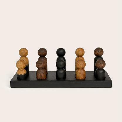 Play & Hang in Black Oak with Mono Palette, a wooden sorting toy that transforms into a children's coat rack by Woodsie Wonder.