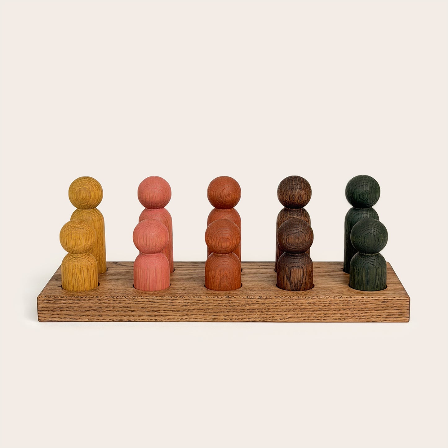 Play & Hang in Brown Oak with Earth Palette, a wooden sorting toy that transforms into a children's coat rack by Woodsie Wonder.