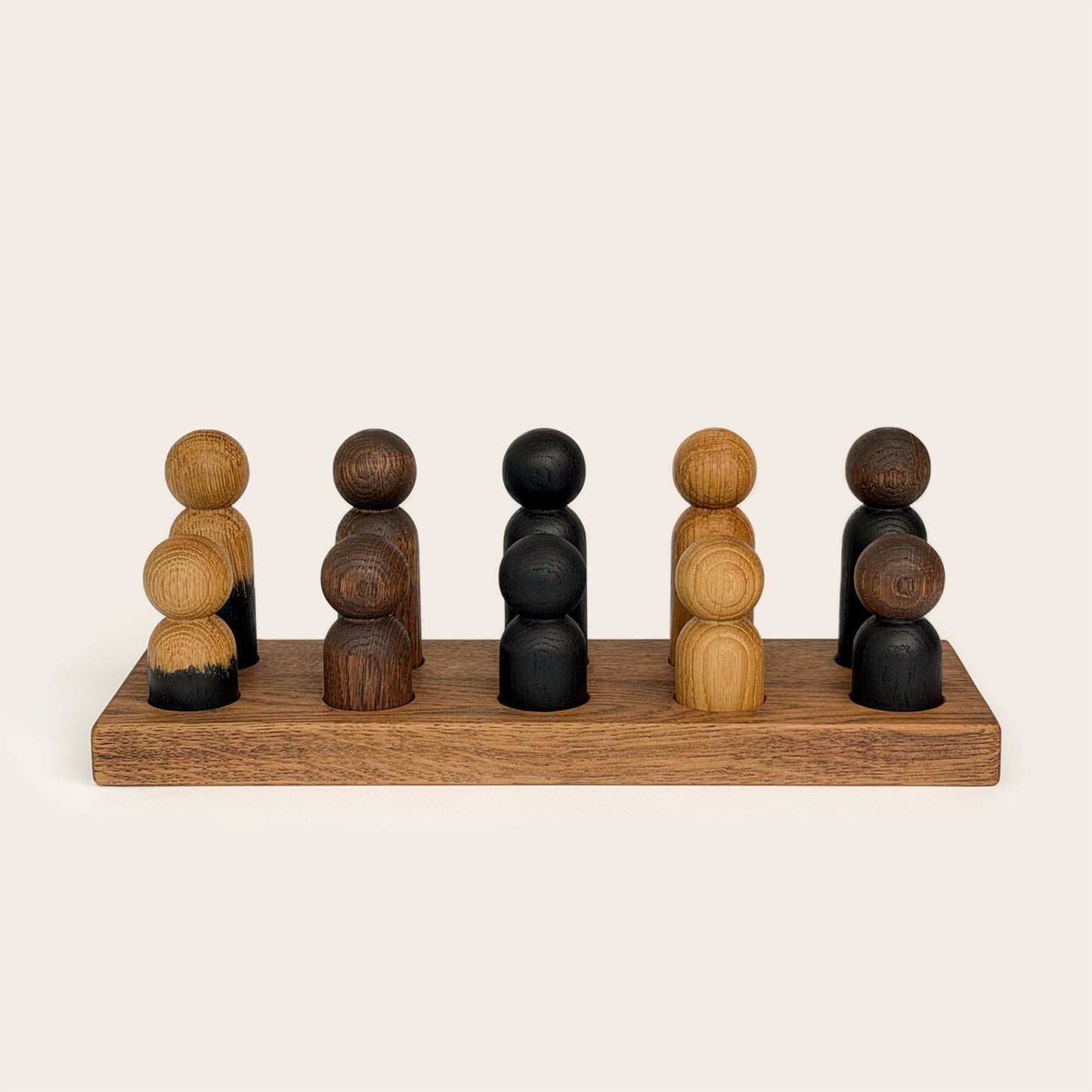 Play & Hang in Brown Oak with Mono Palette, a wooden sorting toy that transforms into a children's coat rack by Woodsie Wonder.