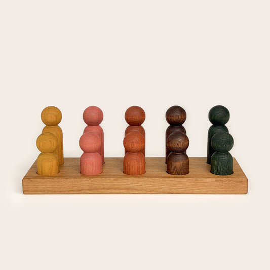 Play & Hang in Natural Oak with Earth Palette, a wooden sorting toy that transforms into a children's coat rack by Woodsie Wonder.